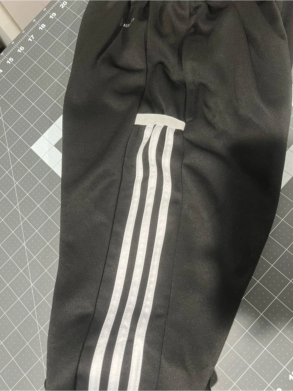 adidas Kids' Black Track Pants with White Stripes, and ankle zippers Size: M